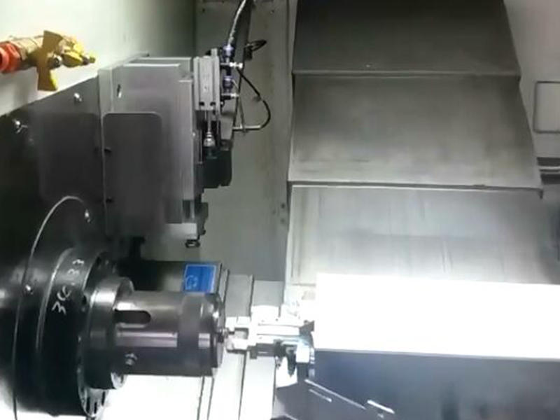 CNC lathe machine SNK-46 processing a cell phone parts