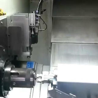 CNC lathe machine SNK-46 processing a cell phone parts